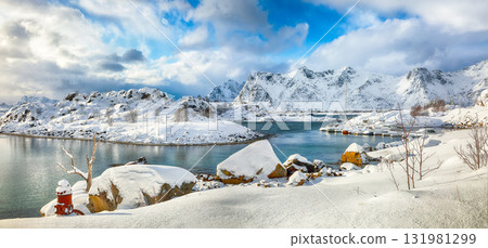 Amazing winter scenery with lots of snow  in small fishing village and snowy  mountain peaks near Valberg. 131981299