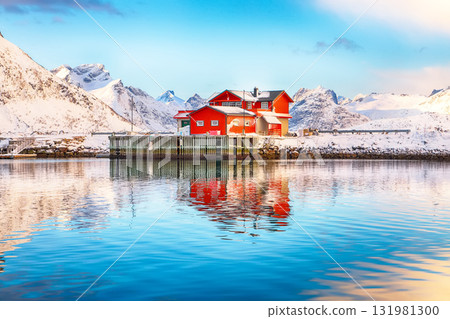 Astonishing morning view of small fishing village Ramberg at sunrise. 131981300