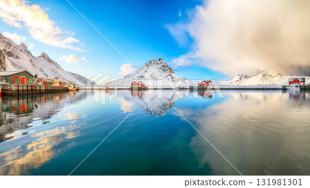 Astonishing morning view of small fishing village Ramberg at sunrise. Astonishing morning view of small fishing village Ramberg at sunrise. 131981301
