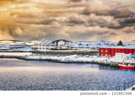 Amazing morning view of small fishing village Ramberg and  Fredvang bridge at sunset. 131981306