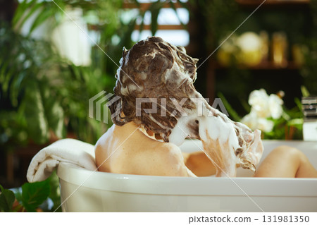 Relaxing Hair Wash of Wavy Brown Hair in Bath Relaxing Hair Wash of Wavy Brown Hair in Bath 131981350