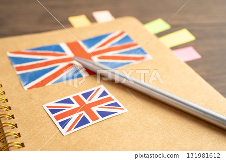 UK flag with pen on english language book. 131981612