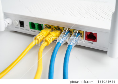 Ethernet cable with wireless router connect to internet service provider internet network. 131981614