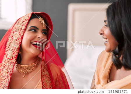 Laughing, bride and bridesmaid getting ready for a wedding, happy and helping in a room. Support, love and a young woman in traditional Indian clothes for marriage ceremony with a friend or sister Laughing, bride and bridesmaid getting ready for a wedding, happy and helping in a room. Support, love and a young woman in traditional Indian clothes for marriage ceremony with a friend or sister 131981771