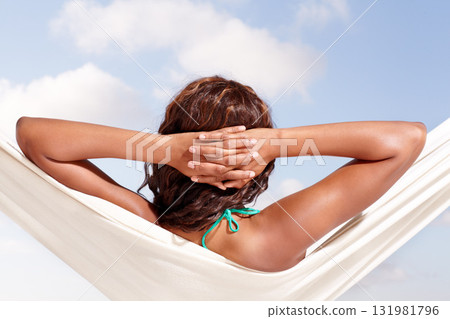 Relax, back and blue sky with woman in hammock for summer, vacation and travel. Holiday, calm and tropical with female person resting on break in outdoor for paradise, exotic and relaxation Relax, back and blue sky with woman in hammock for summer, vacation and travel. Holiday, calm and tropical with female person resting on break in outdoor for paradise, exotic and relaxation 131981796