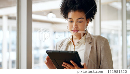 Tablet, research and business woman in office, typing on internet or networking on website. Technology, African professional consultant reading email and scroll on digital app in communication online Tablet, research and business woman in office, typing on internet or networking on website. Technology, African professional consultant reading email and scroll on digital app in communication online 131981820