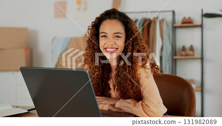 Woman, small business, and fashion in portrait for logistics, e commerce or remote by communication. Person, entrepreneur and laptop in office for online, planning or shipment of order on computer Woman, small business, and fashion in portrait for logistics, e commerce or remote by communication. Person, entrepreneur and laptop in office for online, planning or shipment of order on computer 131982089