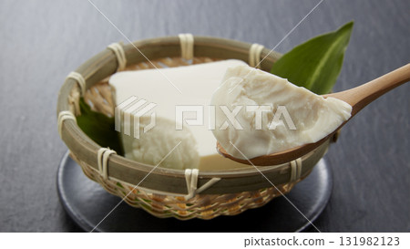 Close-up of tofu on a black background Close-up of tofu on a black background 131982123