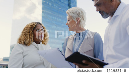 Collaboration, rooftop and team of business people with documents on a building in city. Meeting, discussion and group of professional lawyers with legal paperwork for case on office balcony in town. Collaboration, rooftop and team of business people with documents on a building in city. Meeting, discussion and group of professional lawyers with legal paperwork for case on office balcony in town. 131982146
