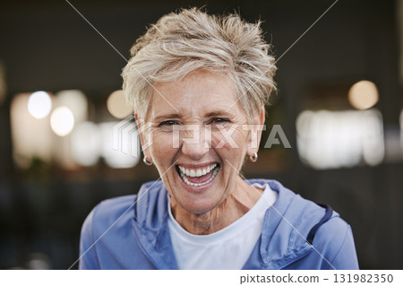 Fitness, smile and portrait of old woman in gym for workout, health and exercise goals. Happy, training and wellness with face of senior lady laughing in sports studio for funny, retirement and joke 131982350