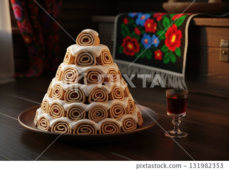 Traditional Moldovan dessert Guguta's Hat a pyramid cake made of sweet pancake rolls 131982353
