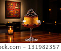 Panamanian sopa borracha a rum soaked sponge cake with raisins and prunes in a coupe glass 131982357