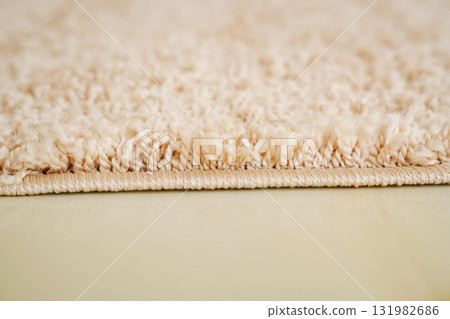 close-up. beige Interior pile carpet made of polypropylene. close-up. beige Interior pile carpet made of polypropylene. 131982686