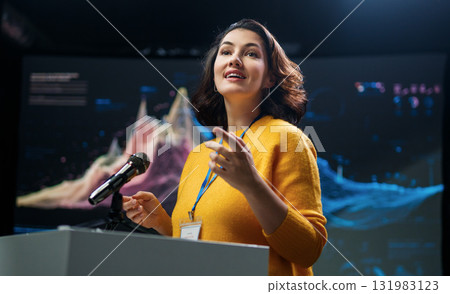 woman is giving a presentation at conference 131983123