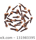 Dried cloves on white background. Bunch of aromatic flower buds of the tree Syzygium aromaticum, used as spice, flavoring, or fragrance, in cuisine, cosmetic products, etc. Close-up, from above. Photo 131983395