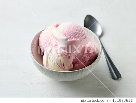 bowl of pink raspberry ice cream bowl of pink raspberry ice cream 131983631