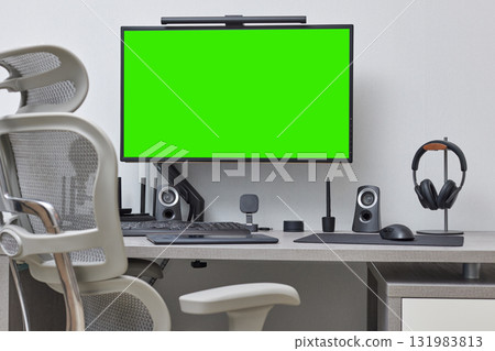 modern comfortable workspace for remote work. empty green computer pc and setup for freelancer from home office modern comfortable workspace for remote work. empty green computer pc and setup for freelancer from home office 131983813