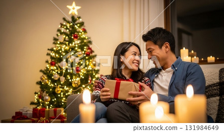 Couple giving presents on Christmas night 131984649