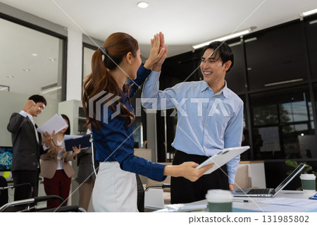 Business team creative businesspeople coworker in office Happy to be successful partnership teamwork success concept. 131985802