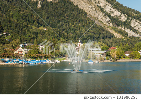 Harbor and fountain on Lake Walensee in Weesen, Canton of St. Gallen, Switzerland Harbor and fountain on Lake Walensee in Weesen, Canton of St. Gallen, Switzerland 131986253