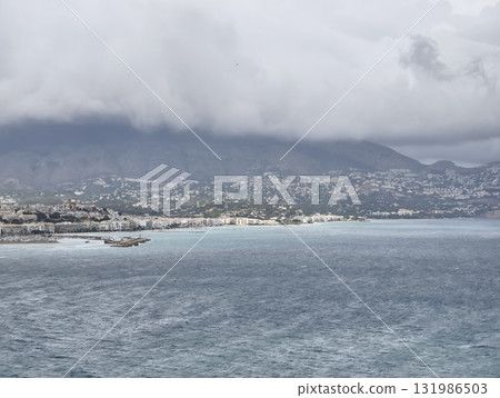 A Beautiful and Serene Coastal View Showcasing Various Cloudy Skies Over the Oceans Surface 131986503
