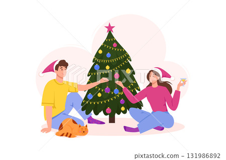 Man and woman decorate Christmas tree. Happy Family celebrating New Year at home together with holiday decorations 131986892