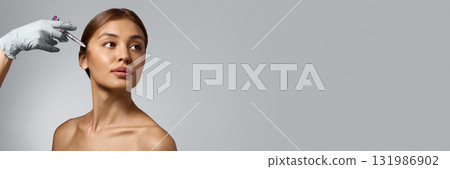Woman receiving aesthetic injection with calm confidence and trust in professional medical care. Banner Woman receiving aesthetic injection with calm confidence and trust in professional medical care. Banner 131986902