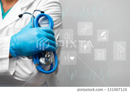 Healthcare professional holding a stethoscope in a clinical environment with medical icons Healthcare professional holding a stethoscope in a clinical environment with medical icons 131987128