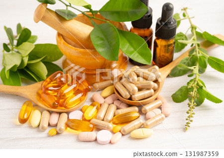 Alternative medicine herbal organic capsule drug herb. 131987359