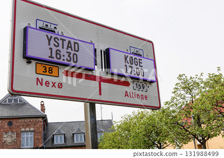 Information board or sign about ferry departures to the Swedish city of Ustad and the Danish city of Koge. Information board or sign about ferry departures to the Swedish city of Ustad and the Danish city of Koge. 131988499