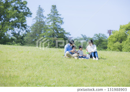 Family having a picnic Family having a picnic 131988903
