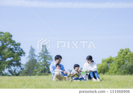 Family having a picnic Family having a picnic 131988906