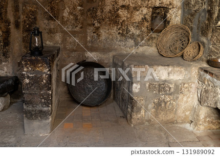 Dark stone kitchen, old style. 131989092