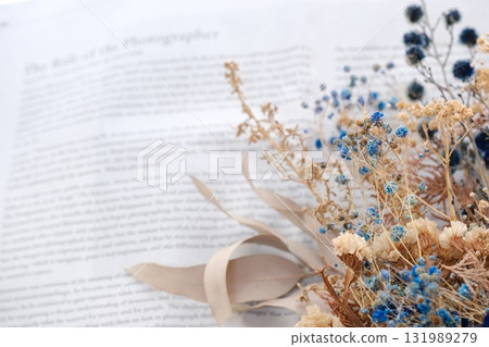 Dried flowers and English newspaper background 131989279