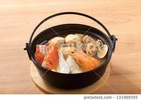 Seafood hotpot (shrimp, cod, salmon, clams, fish balls) Seafood hotpot (shrimp, cod, salmon, clams, fish balls) 131989395