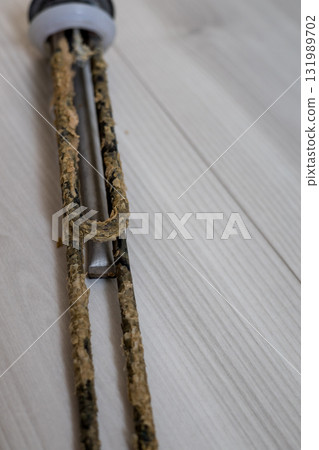 deposits on heating element of an electric boiler. deposits on heating element of an electric boiler. 131989702