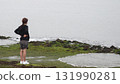 Young woman on the beach 131990281