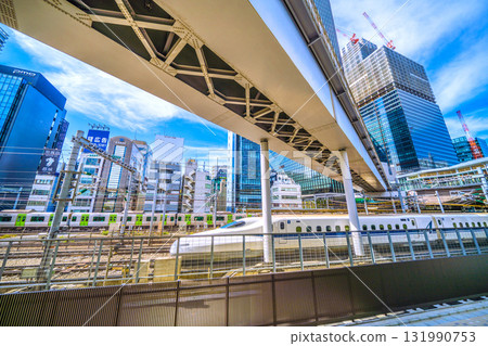 Tokyo cityscape in Japan: Hamamatsucho Station, the World Trade Center Building new main building and terminal construction, Shinkansen, etc. 131990753