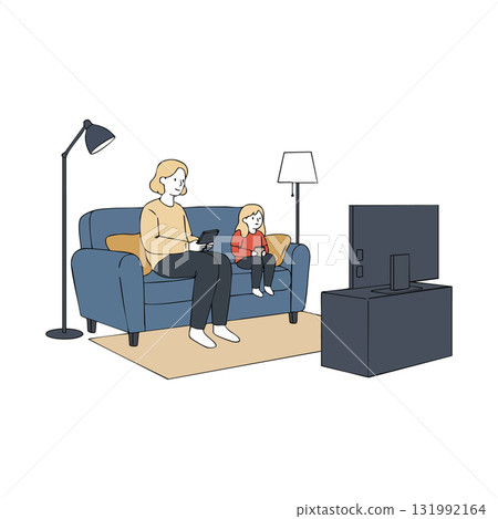 Mother and daughter sitting on sofa watching television together in living room 131992164