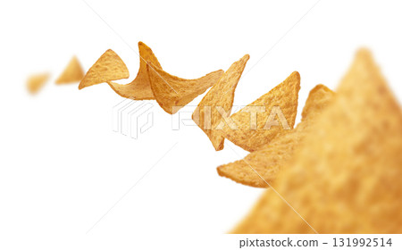 Corn chips of triangular shape levitate on a white background Corn chips of triangular shape levitate on a white background 131992514