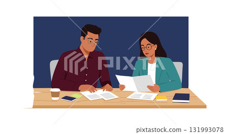 Two professionals collaborating over documents in office environment with coffee and technology 131993078