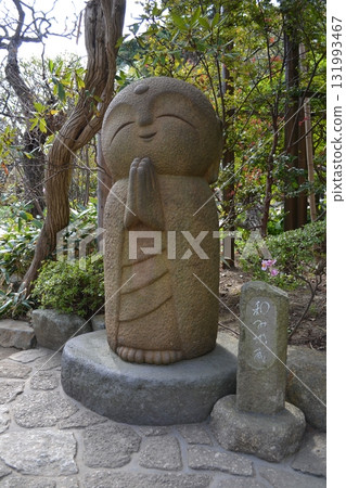 Buddha statue with hands clasped together Buddha statue with hands clasped together 131993467