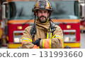 A confident bearded firefighter in full protective gear and helmet stands with arms crossed, portraying professionalism and service against a blurred red fire truck background. AI Generated 131993660