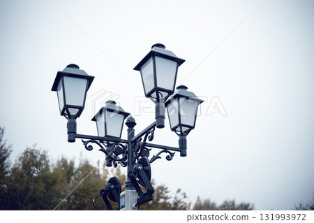 Street lamps on the background of the sky Street lamps on the background of the sky 131993972
