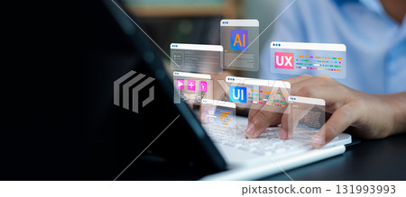 UI UX designer coding artificial intelligence interface on laptop, software developer designing user experience and AI technology concept UI UX designer coding artificial intelligence interface on laptop, software developer designing user experience and AI technology concept 131993993