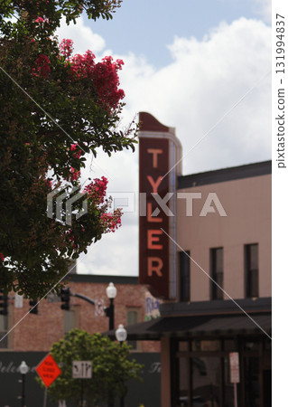 Crepe Myrtle Trees in Bloom Downtown Tyler TX with Neon Tyler Sign in Background 131994837
