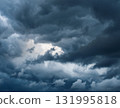 A moody, dark, cloudy background 131995818