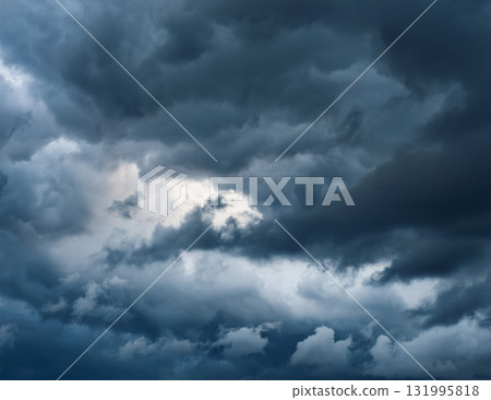 A moody, dark, cloudy background 131995818