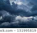 A moody, dark, cloudy background 131995819
