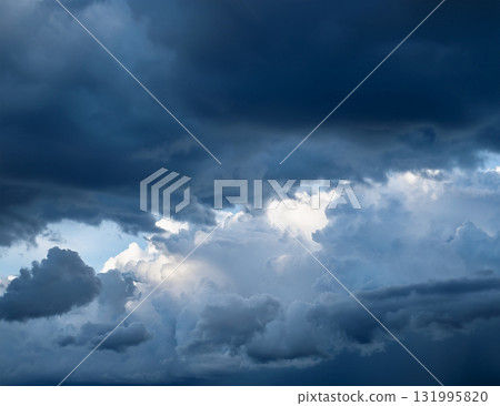 A moody, dark, cloudy background 131995820